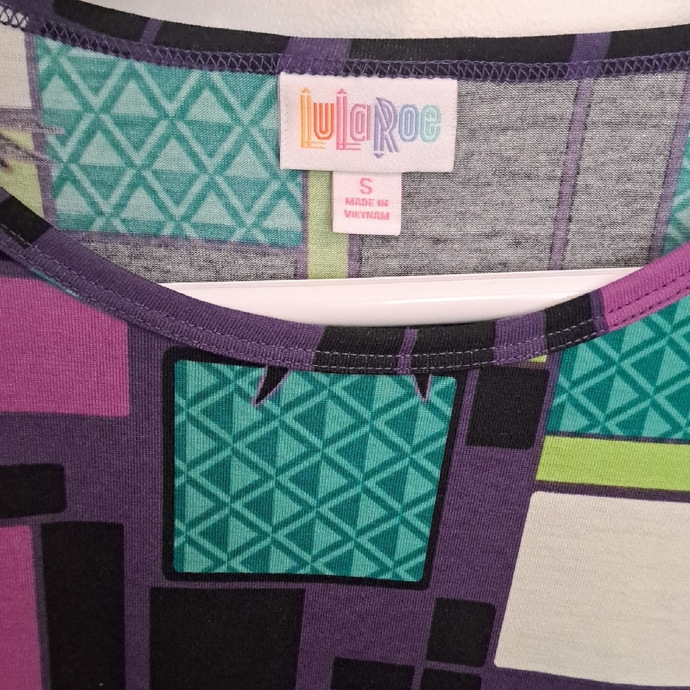 LuLaRoe Disney Maleficient Purple and Green Geometric Top